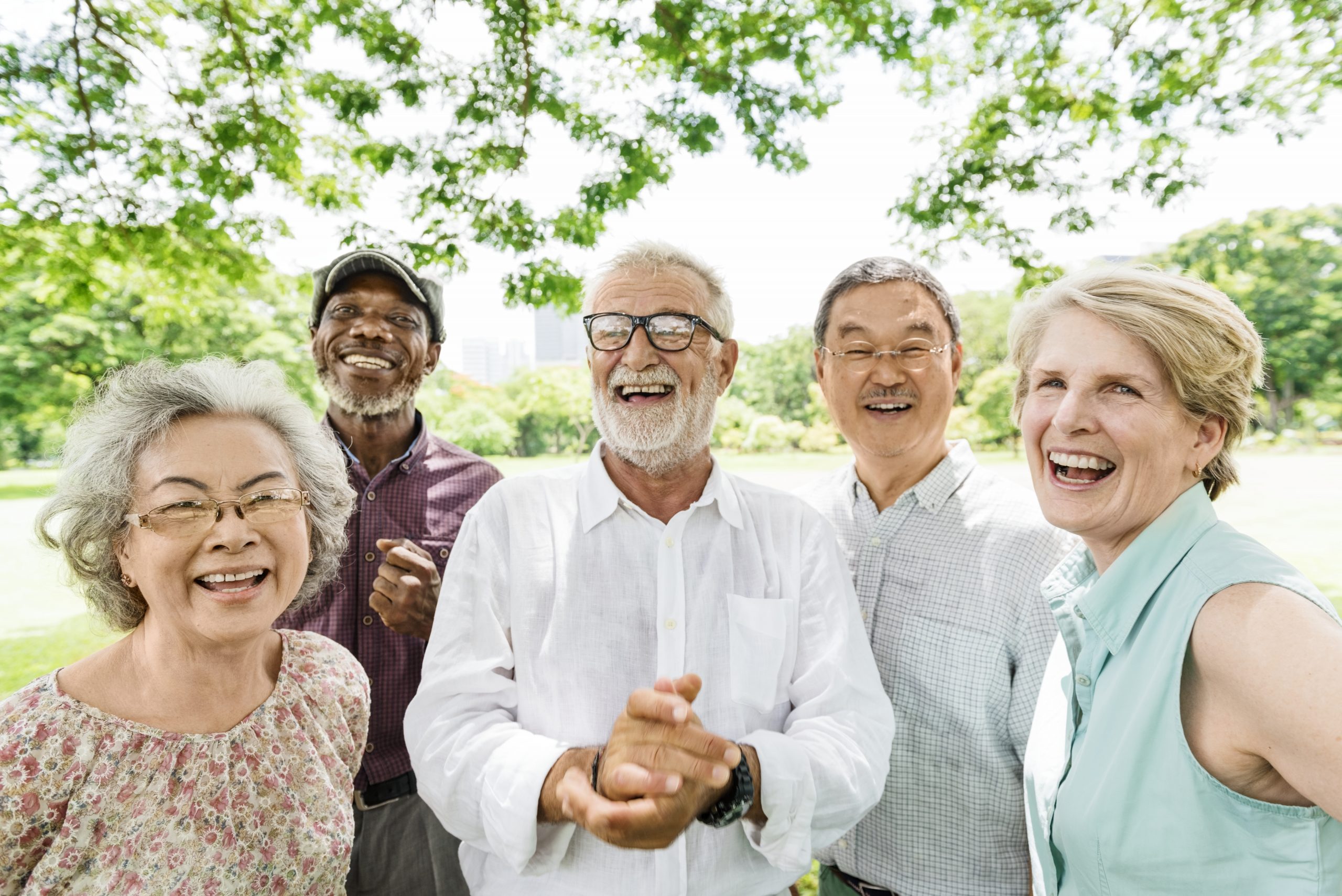 Group of Senior Retirement Friends Happiness Concept Retired Seniors enjoying Medicare Education